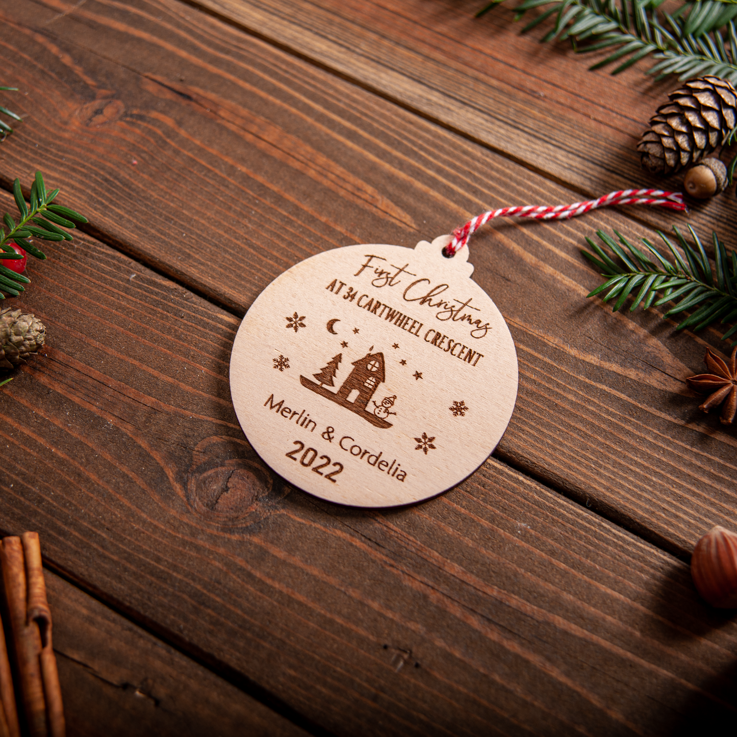 Personalised first home Christmas ornament engraved on wooden bauble