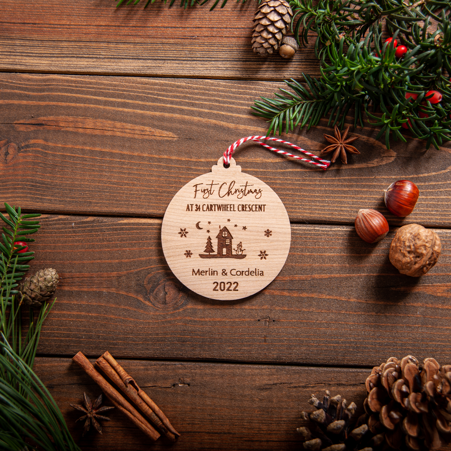 Personalised new home Christmas bauble engraved with address and year