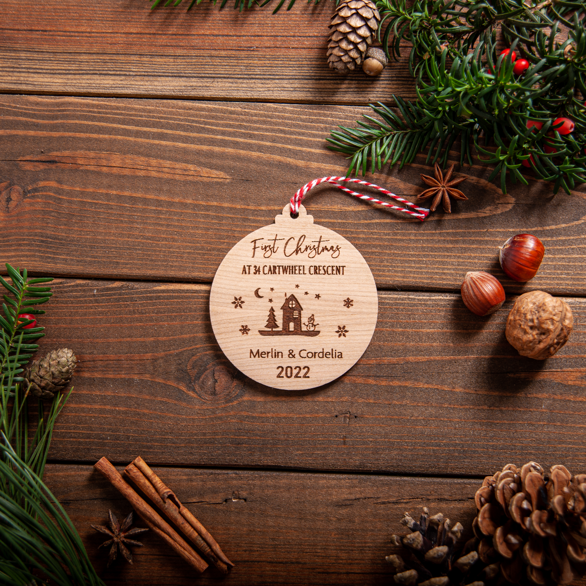 Personalised new home Christmas bauble engraved with address and year