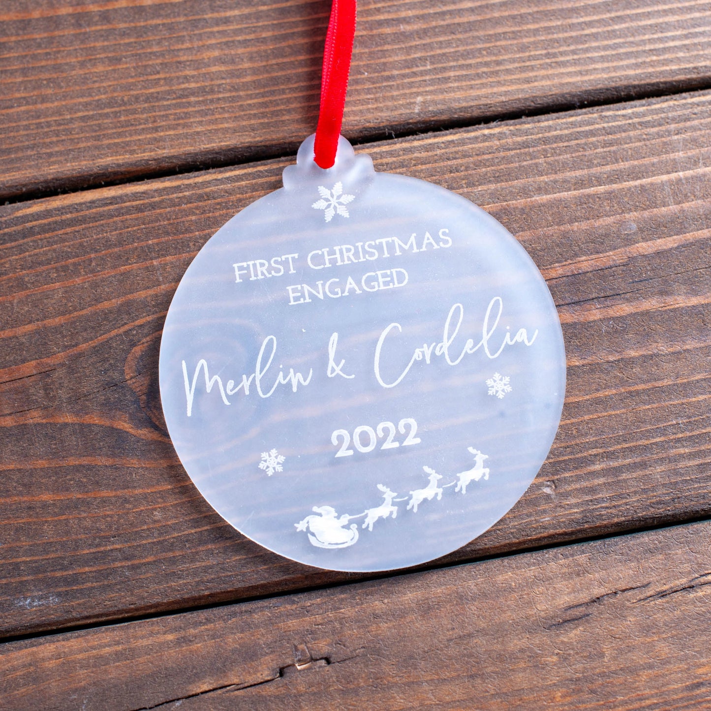 Personalised frosted Christmas bauble for engaged couple