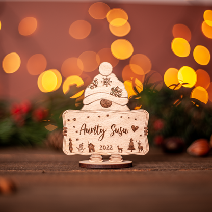 Personalised Christmas gnome place setting with custom name tag on festive table