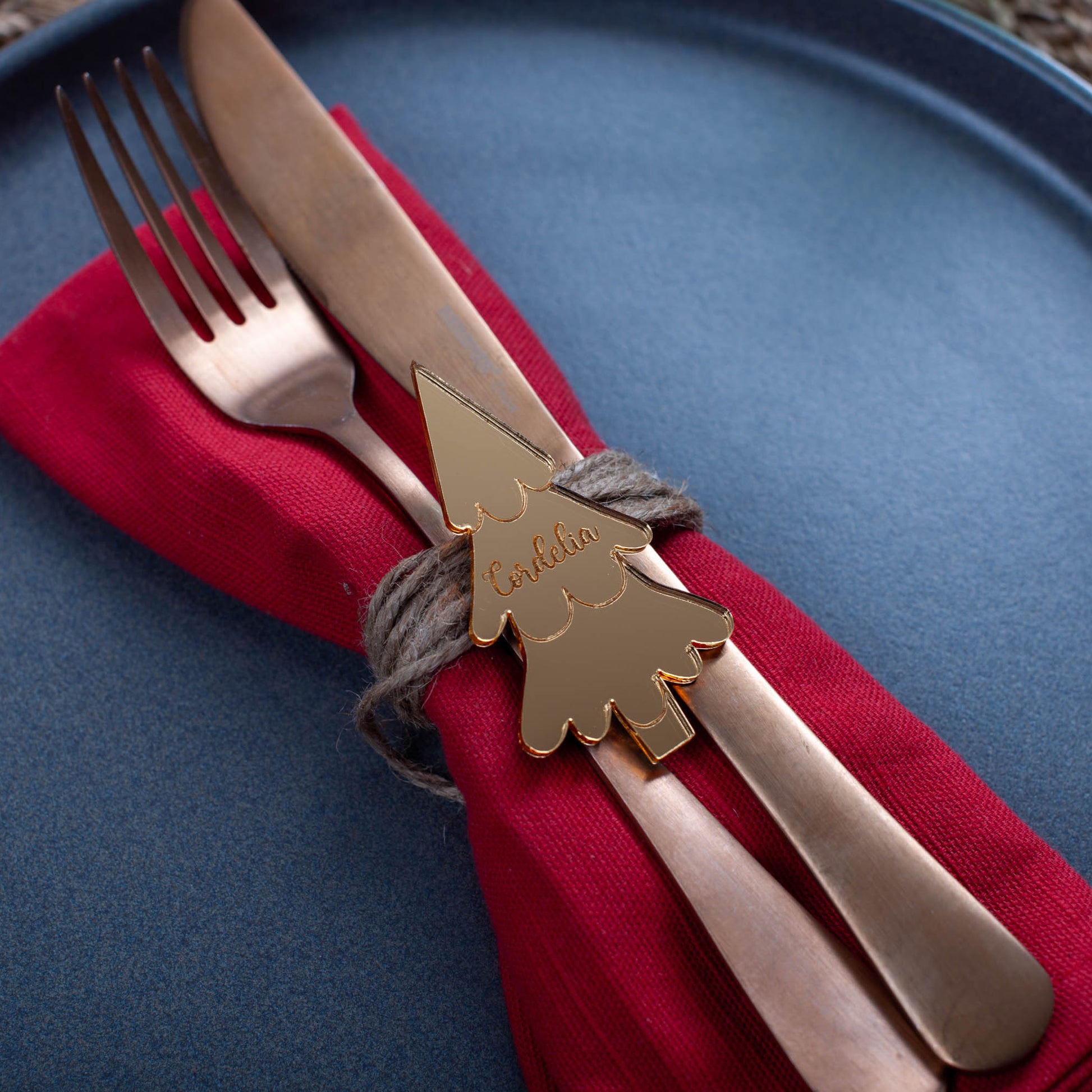 Bespoke laser cut Christmas tree favour in elegant gold acrylic for festive dinner décor