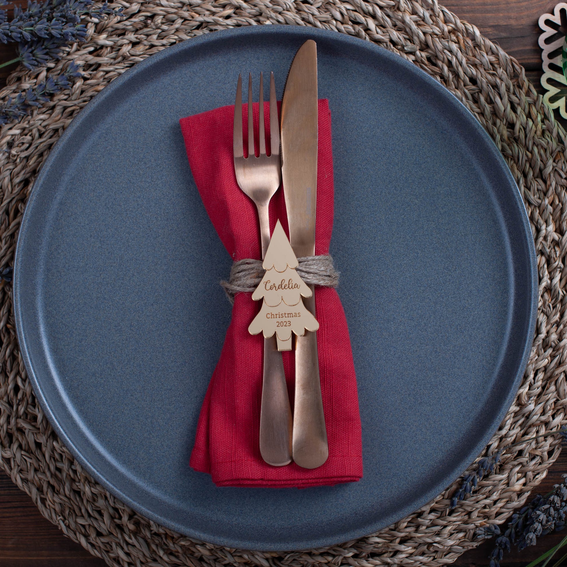 Personalised mirrored acrylic Christmas favour on elegant winter tablescape