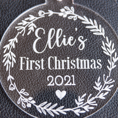 Close-up of engraved flower wreath baby keepsake bauble