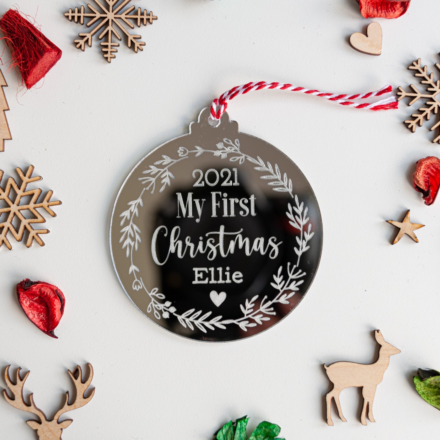 Engraved silver acrylic ornament for baby’s first Christmas tree décor