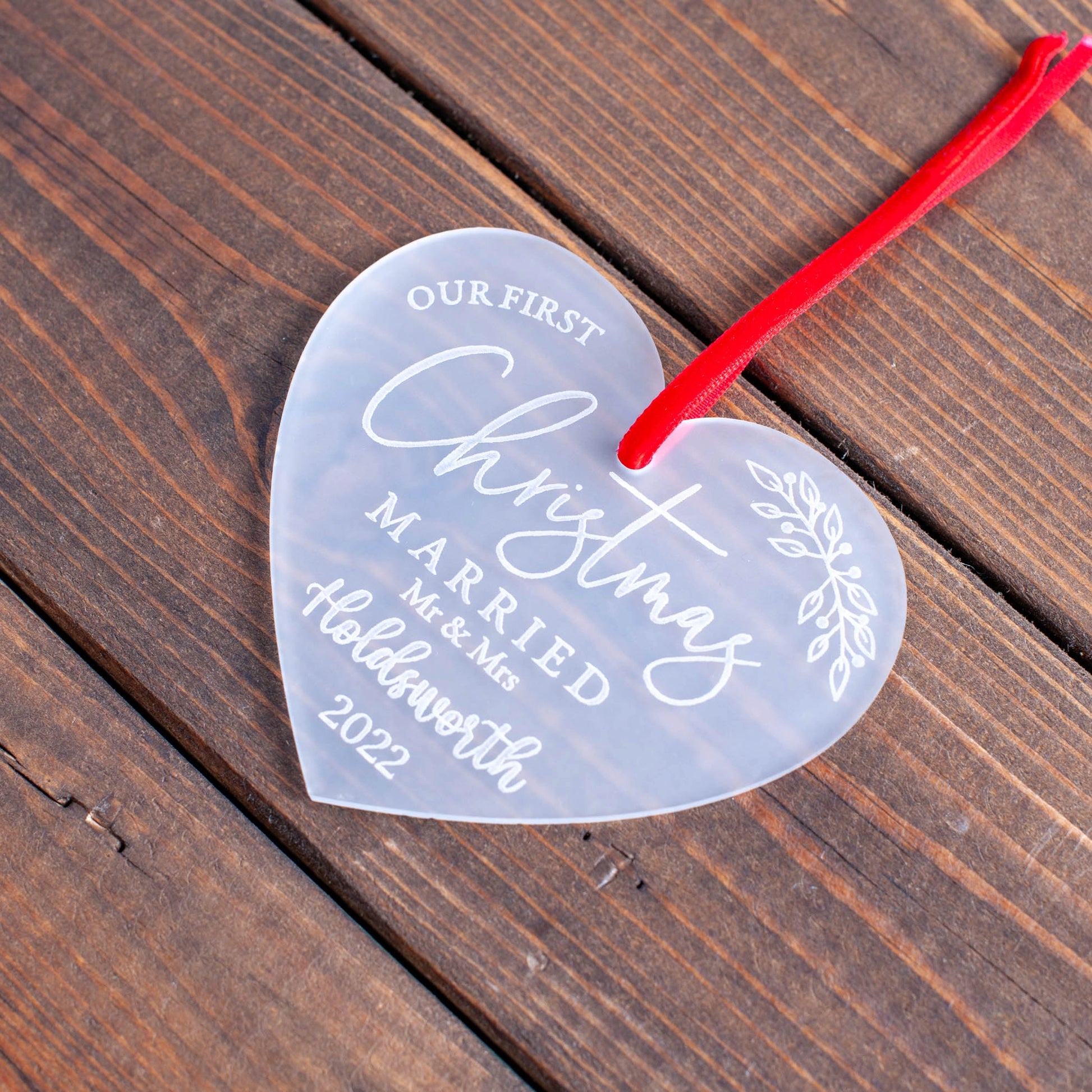 Our first Christmas married personalised frosted ornament on tree