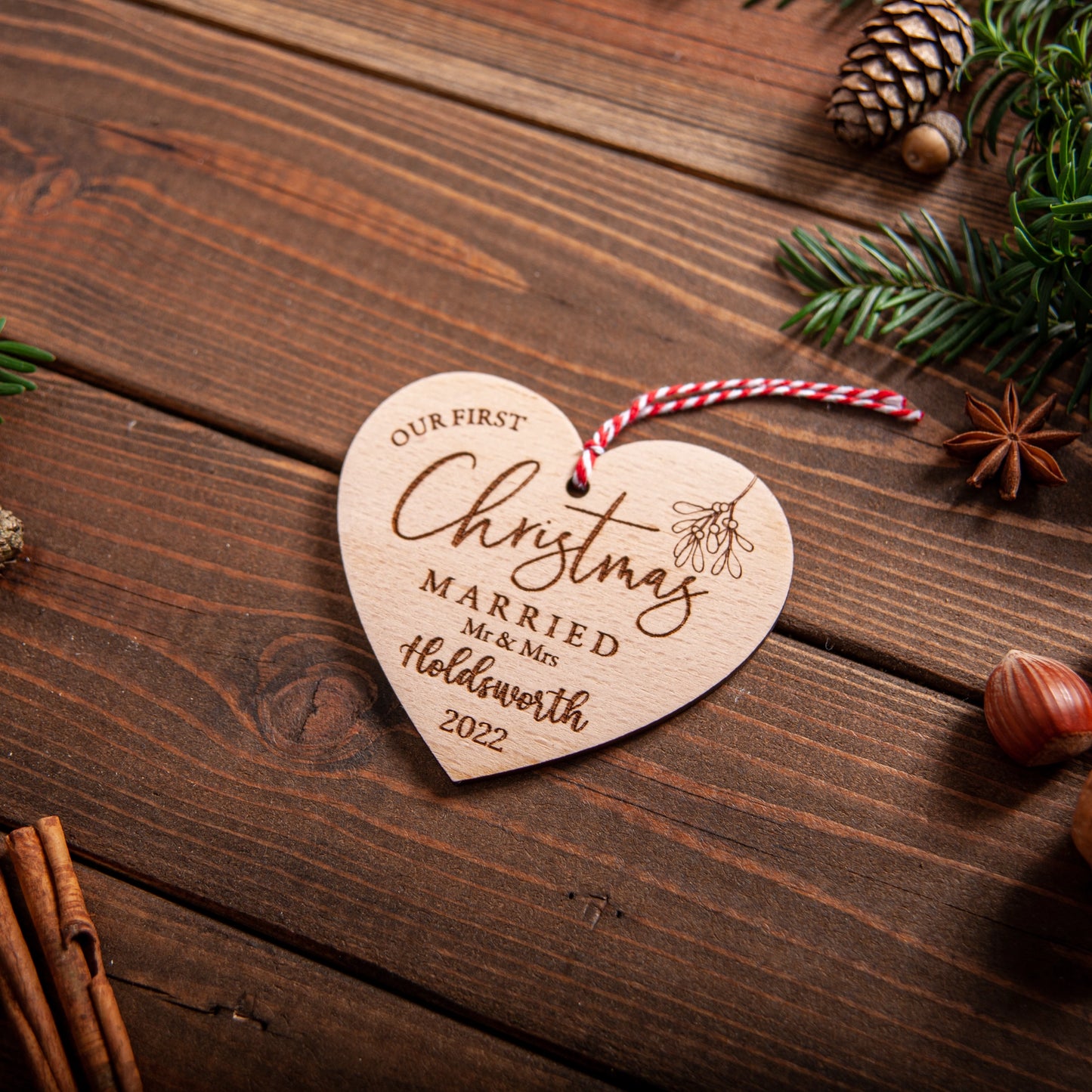 Engraved wooden heart bauble for newlyweds Christmas decoration