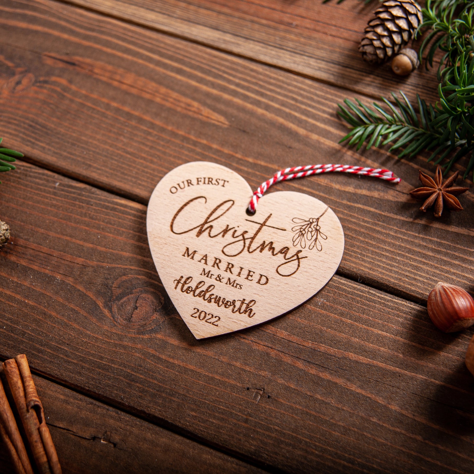 Engraved wooden heart bauble for newlyweds Christmas decoration
