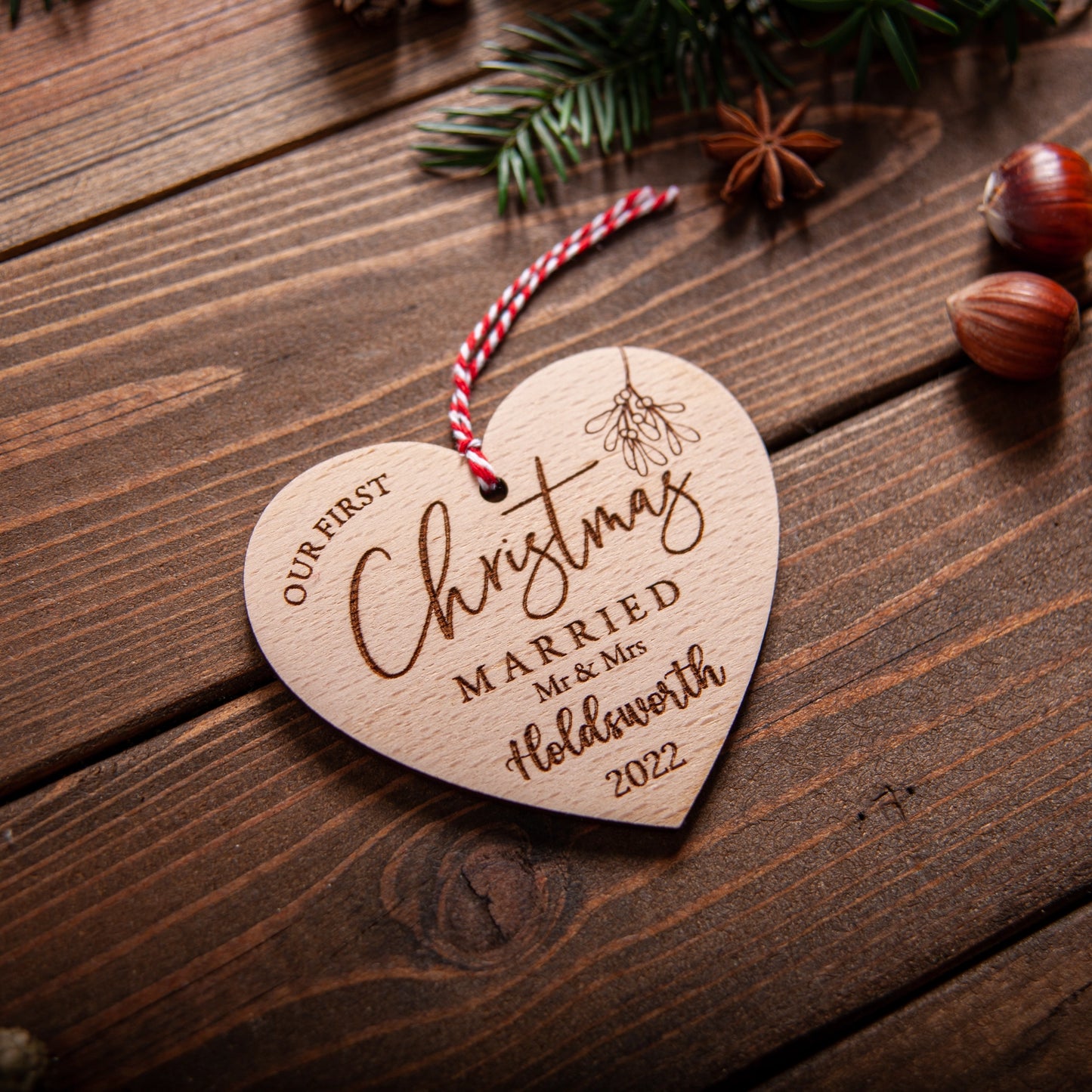 Custom wooden heart ornament with names and year engraved