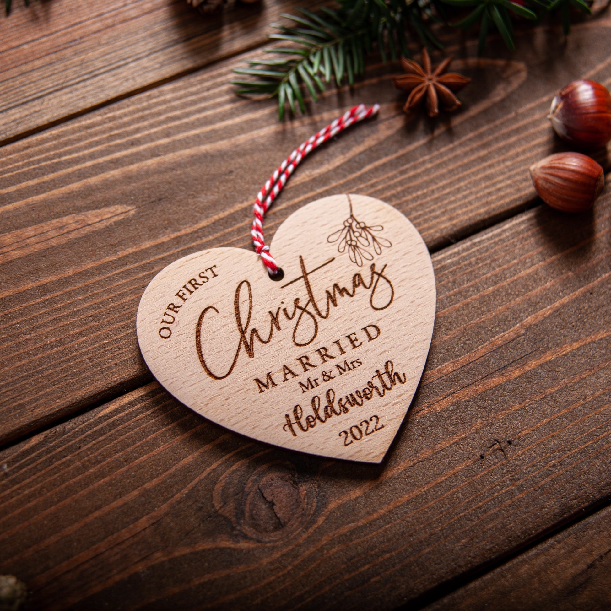 Custom wooden heart ornament with names and year engraved