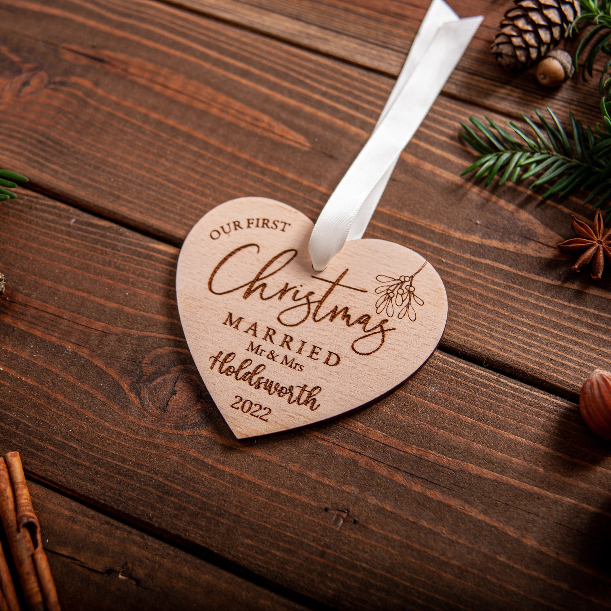 Custom couple ornament engraved with names for festive décor