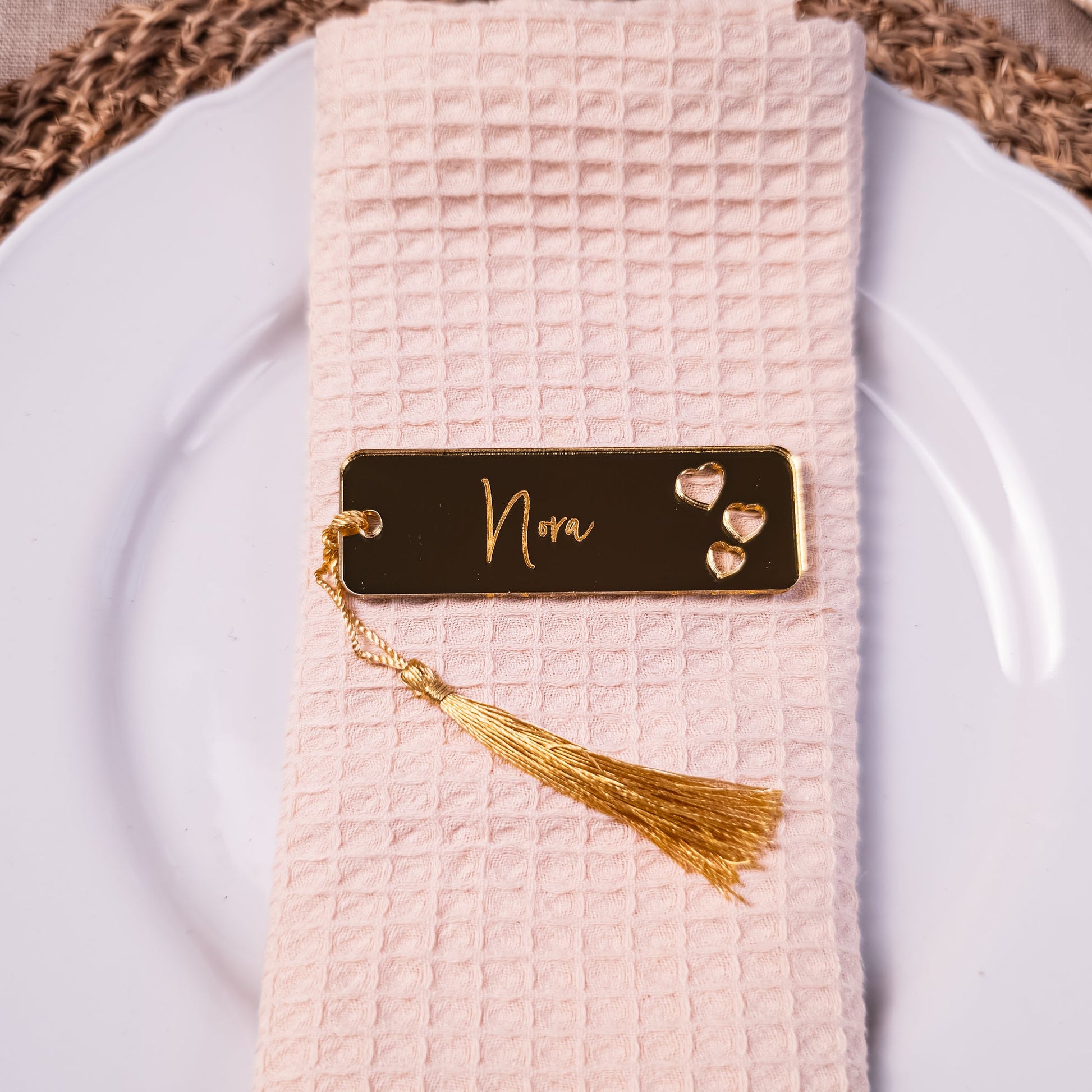 Personalised wedding place name with heart cut out for luxury table setting