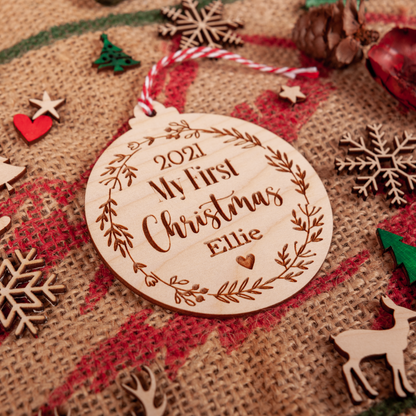 Natural wood first Christmas ornament personalised with year