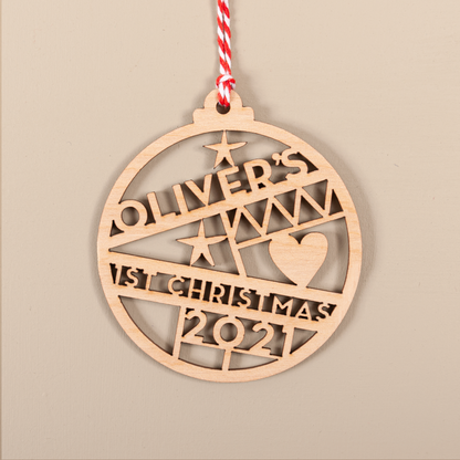 Personalised cut-out typography baby name bauble with year