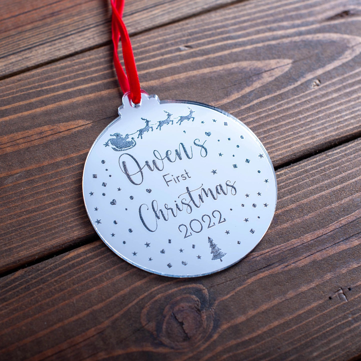 Luxury silver mirror baby ornament hanging on Christmas tree