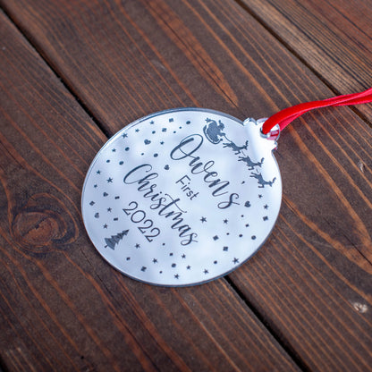 Reflective silver acrylic bauble engraved with Santa sleigh scene