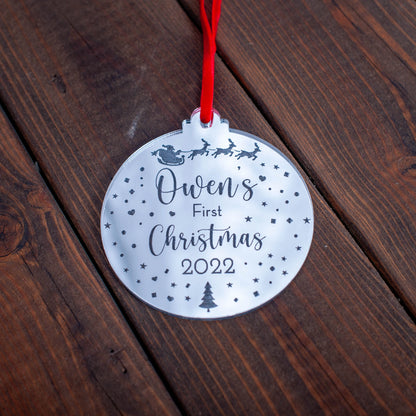 Silver mirror baby’s first Christmas bauble engraved with Santa and sleigh design