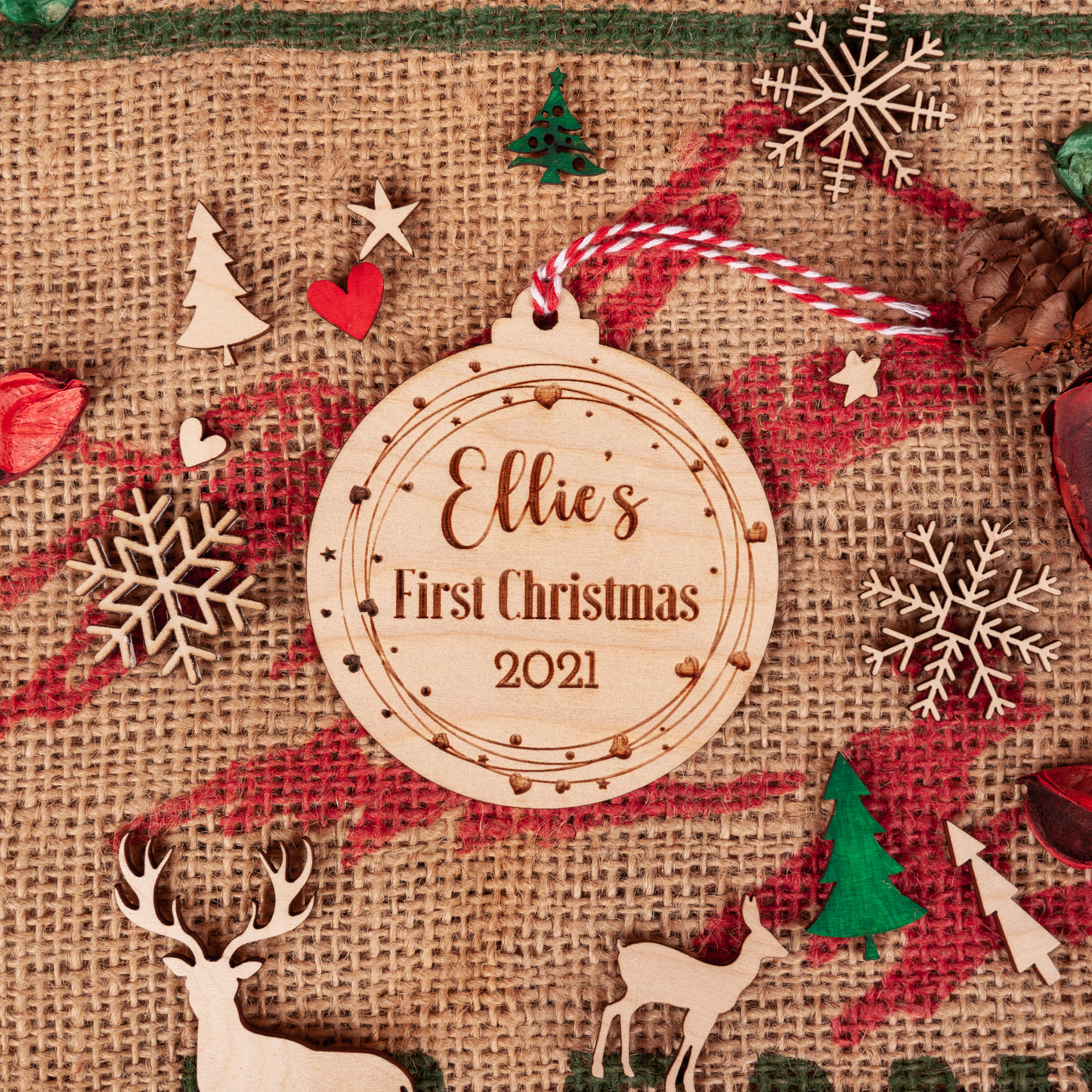 Close-up of engraved heart wreath first Christmas keepsake