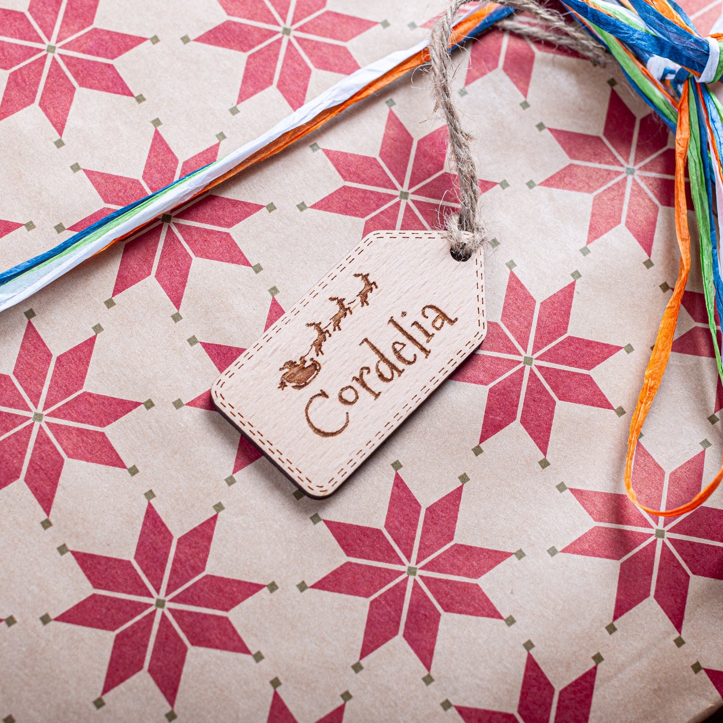 Engraved wooden Christmas gift tag with Santa and sleigh design
