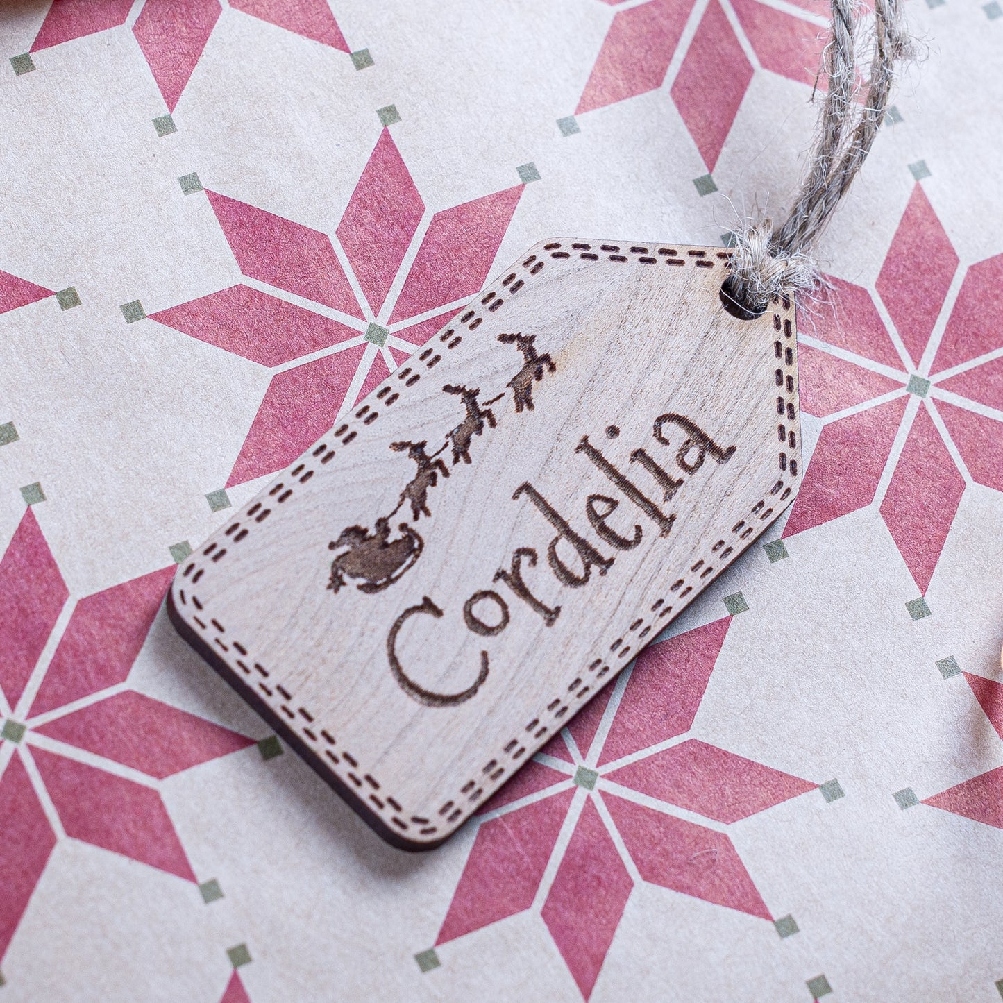 Personalised Christmas gift tag engraved with name and Santa detail