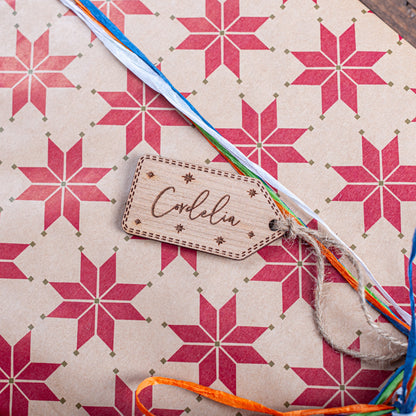Custom name wooden gift tag with star detail for holiday presents