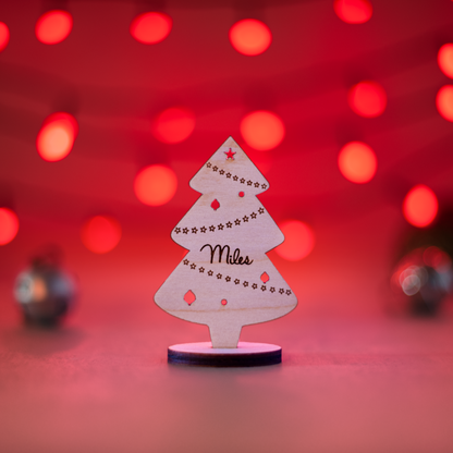 Luxury winter wedding table setting with free-standing tree name ornaments