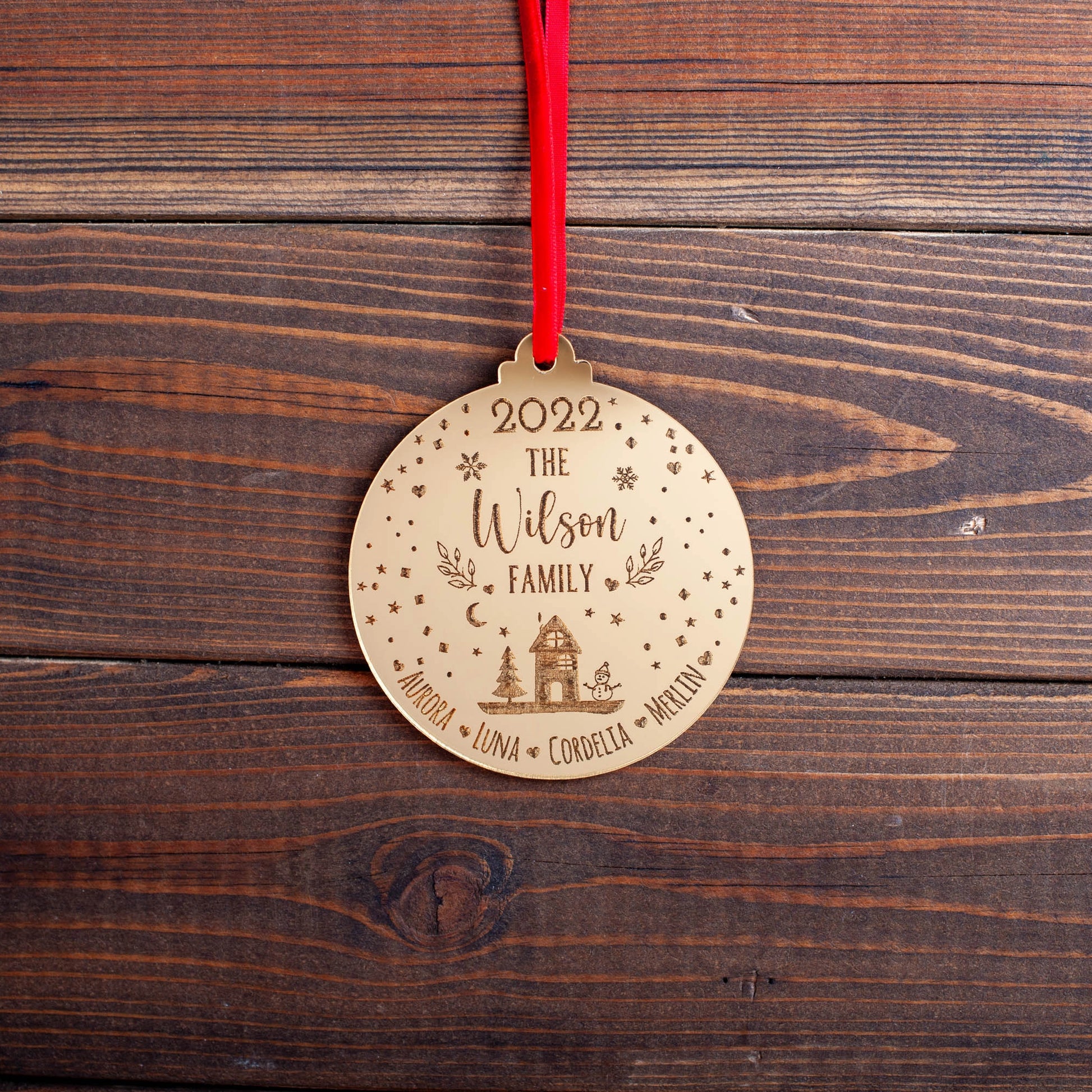 Personalised family ornament with engraved festive snowglobe scene