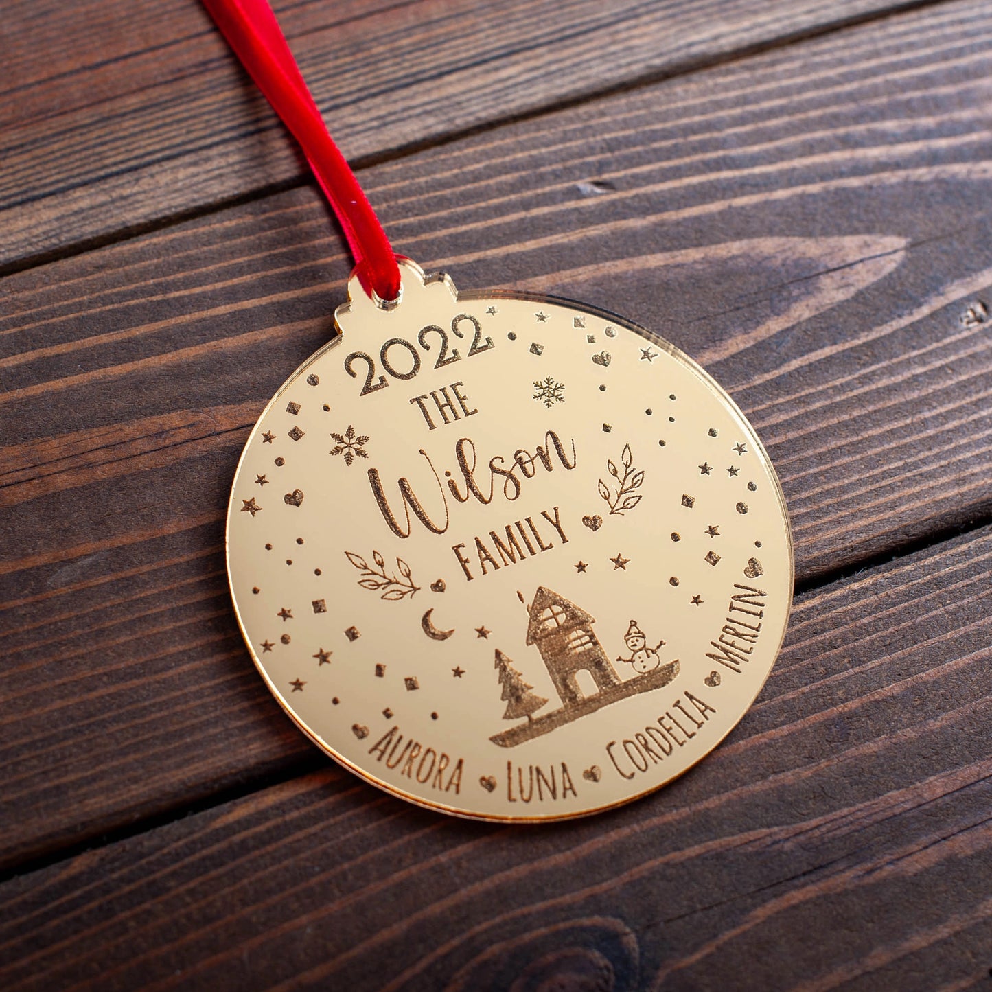 Engraved family name snowglobe ornament with ribbon