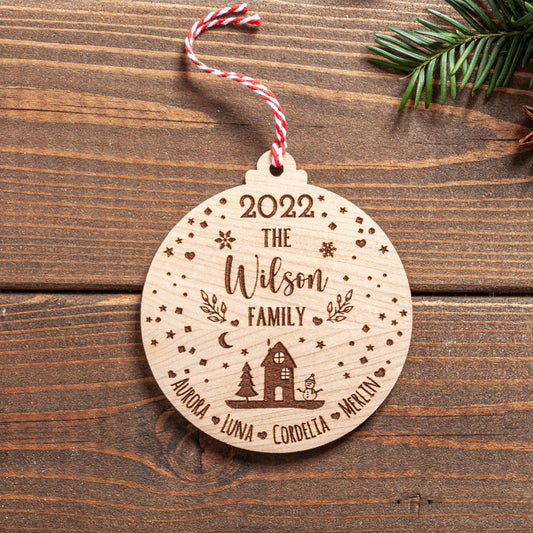 Personalised family Christmas bauble with engraved snowglobe design
