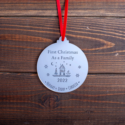 Silver mirror family ornament featuring engraved names of each member