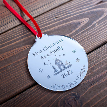 Gold mirror family ornament featuring engraved names of each member