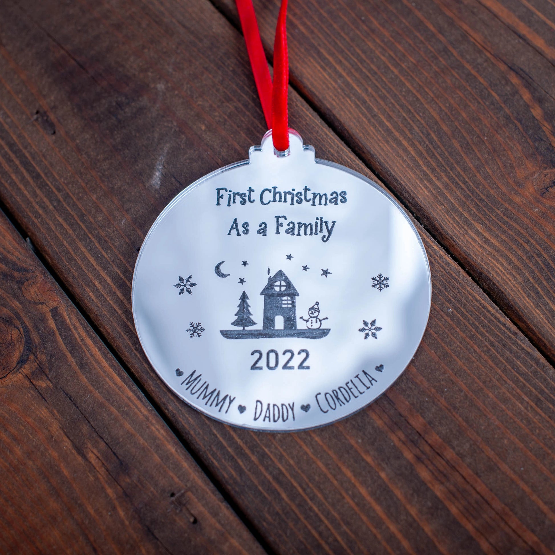 Personalised family Christmas bauble engraved with names and year