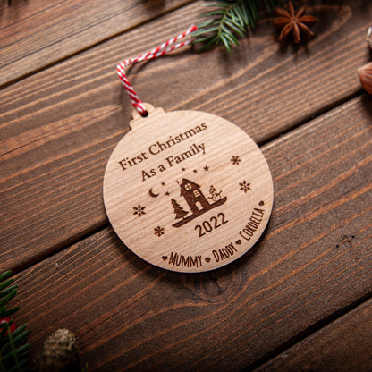 Engraved wooden family Christmas bauble with names and year