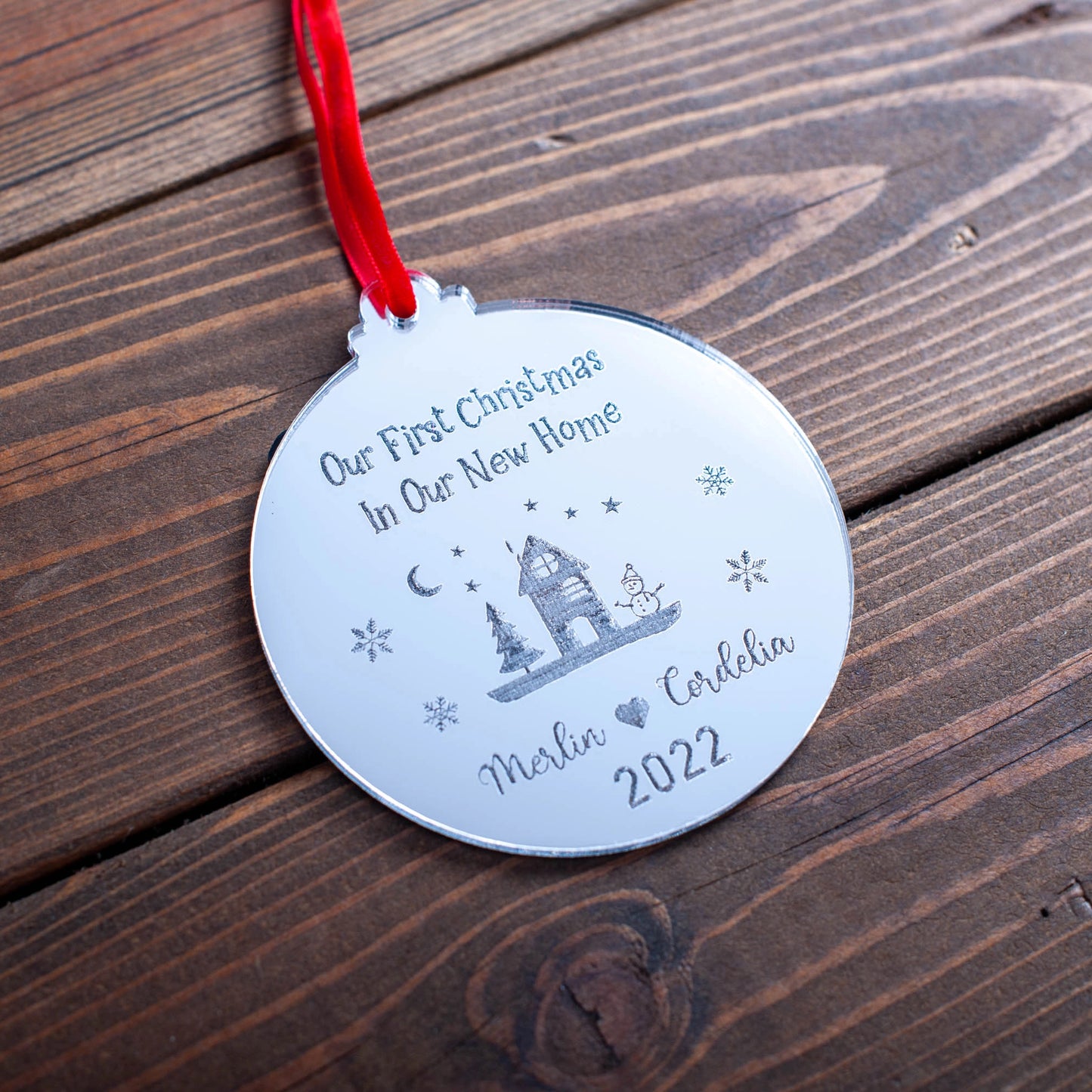 Personalised silver mirror ornament for couple’s first Christmas in a new home