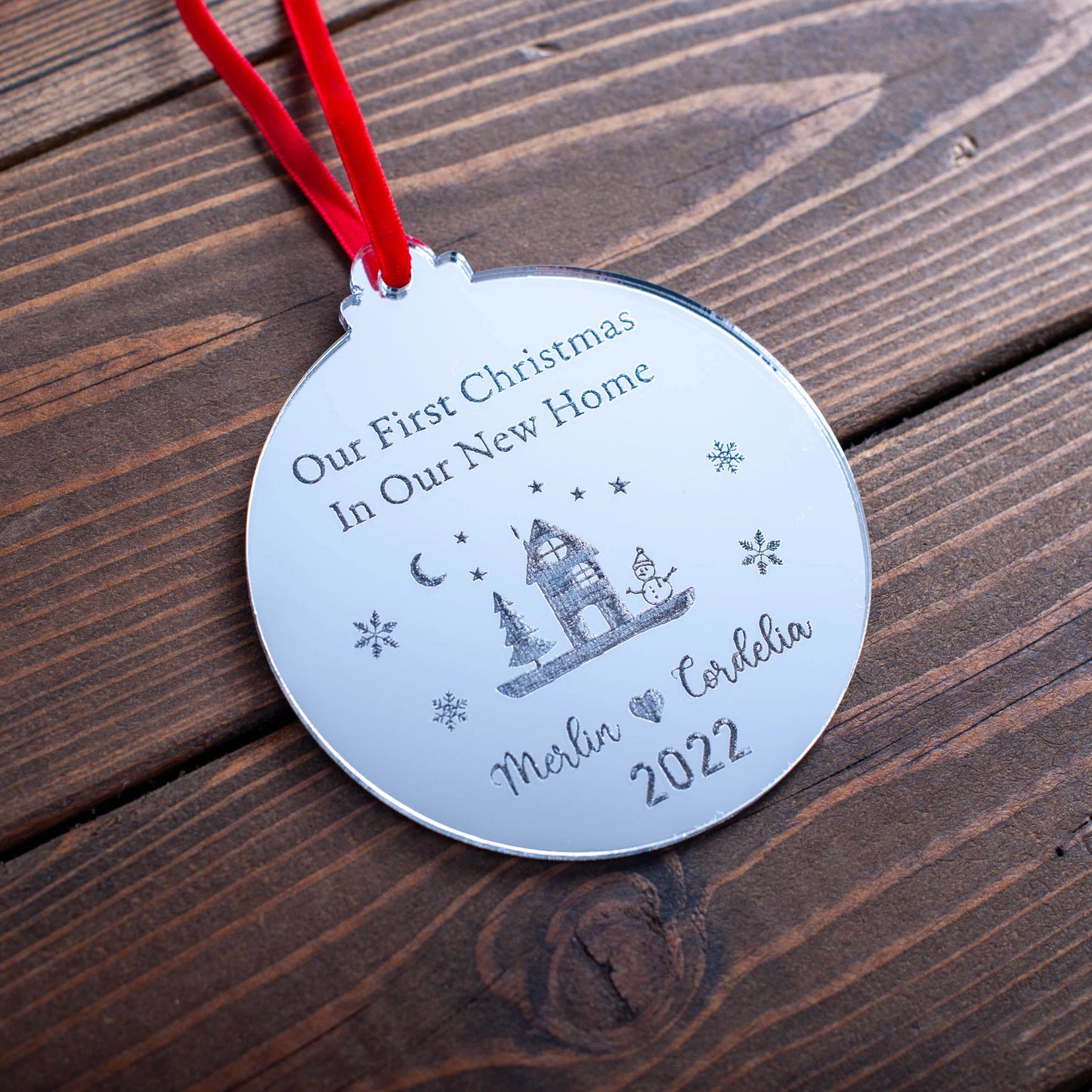 Luxury silver mirror ornament celebrating first Christmas in new home