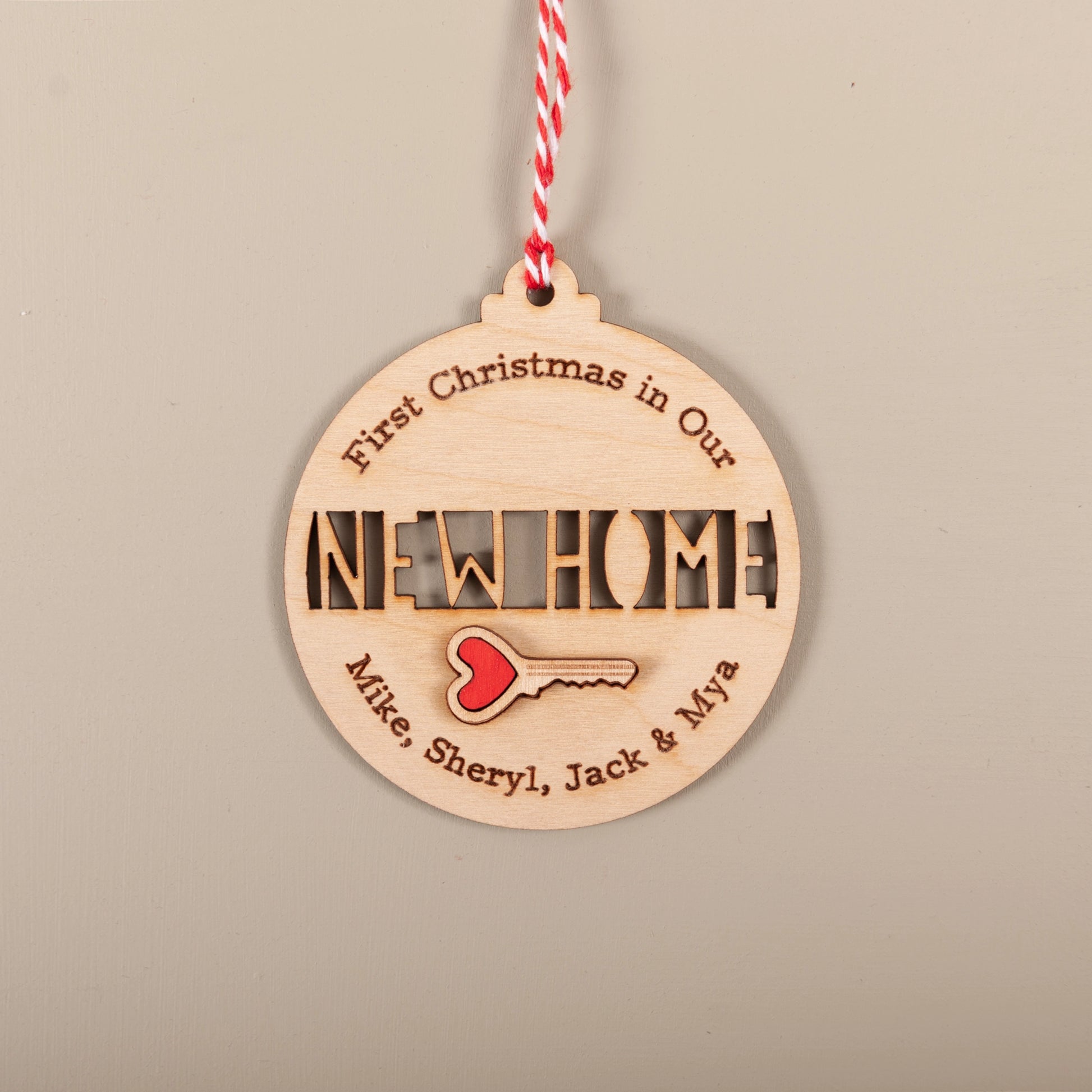 Personalised new home key Christmas ornament engraved on wood