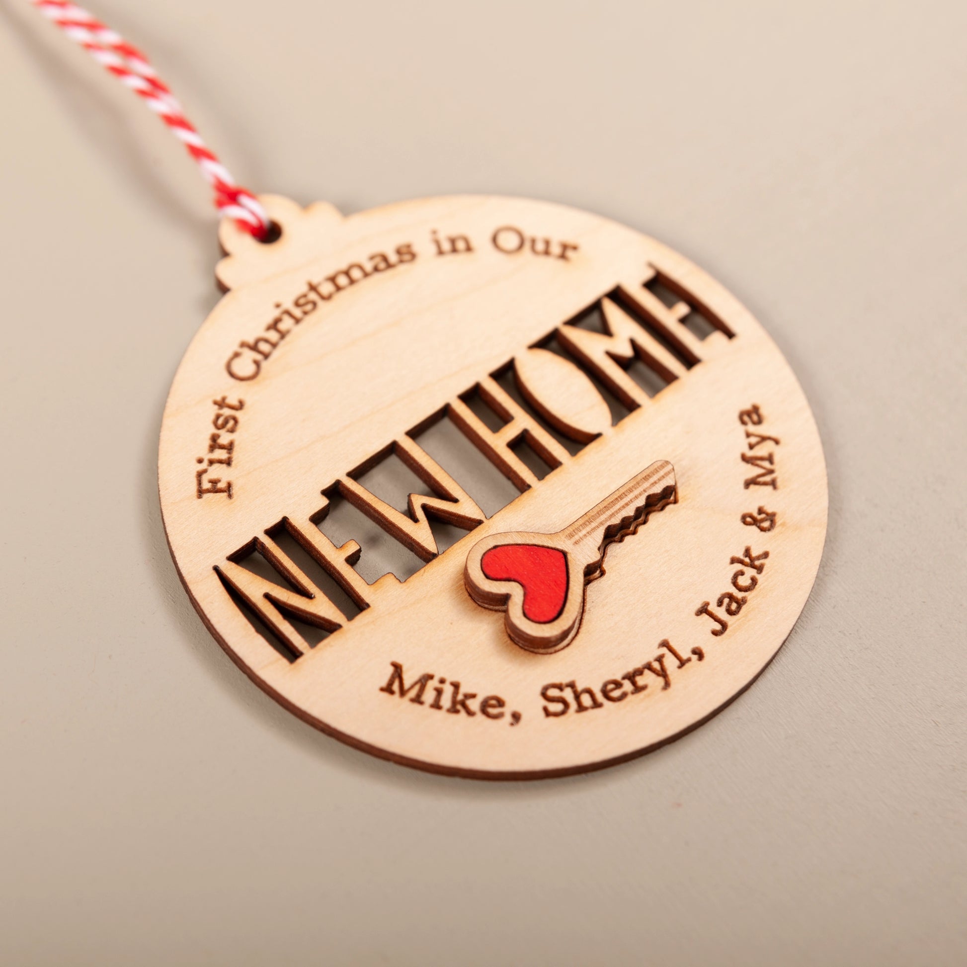 Engraved wooden key bauble for first Christmas in new home