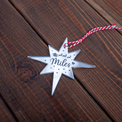 Laser-cut personalised Polaris Christmas decoration with ribbon