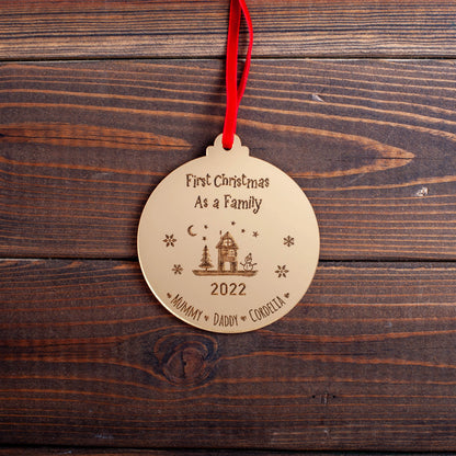 Engraved gold acrylic bauble for family’s first Christmas
