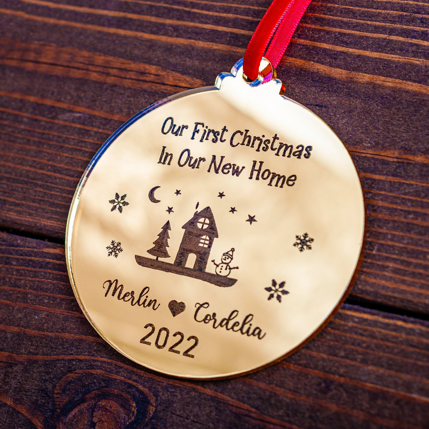 Gold mirror First Home Christmas bauble engraved with couple’s name and year