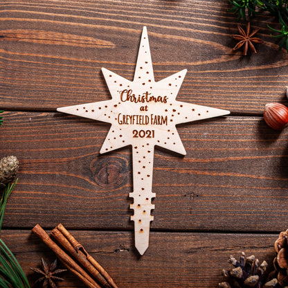 Wooden Polaris star tree topper engraved with Location name