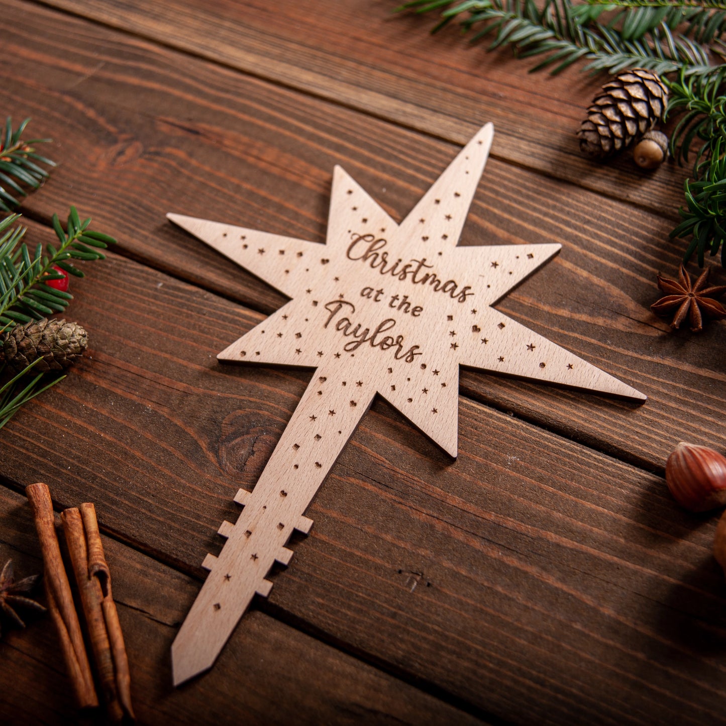 Luxury engraved star tree topper personalised for family name