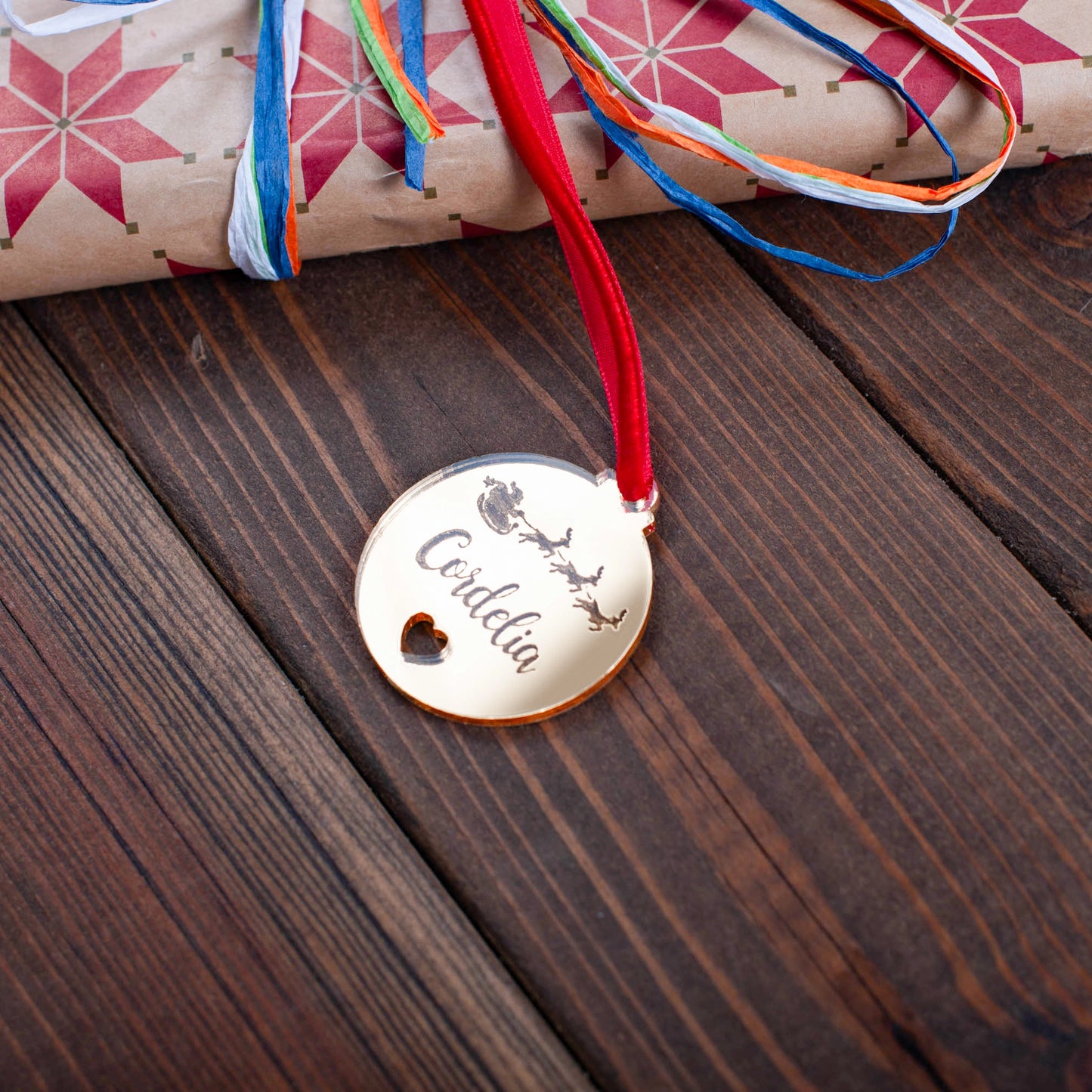 Personalised bauble Christmas gift tag with heart and Santa engraved detail