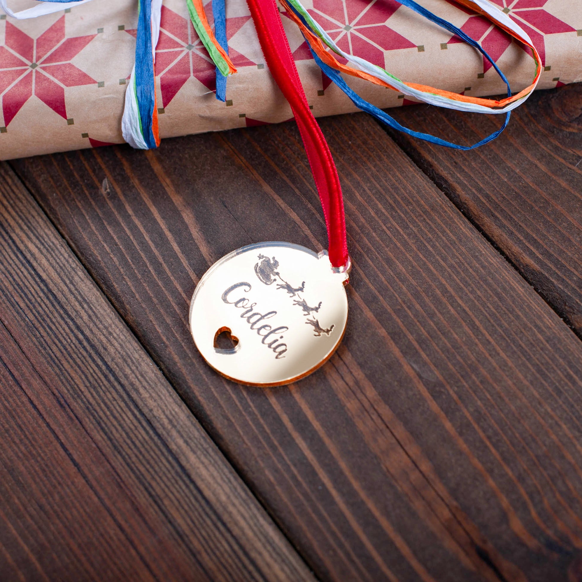 Personalised bauble Christmas gift tag with heart and Santa engraved detail