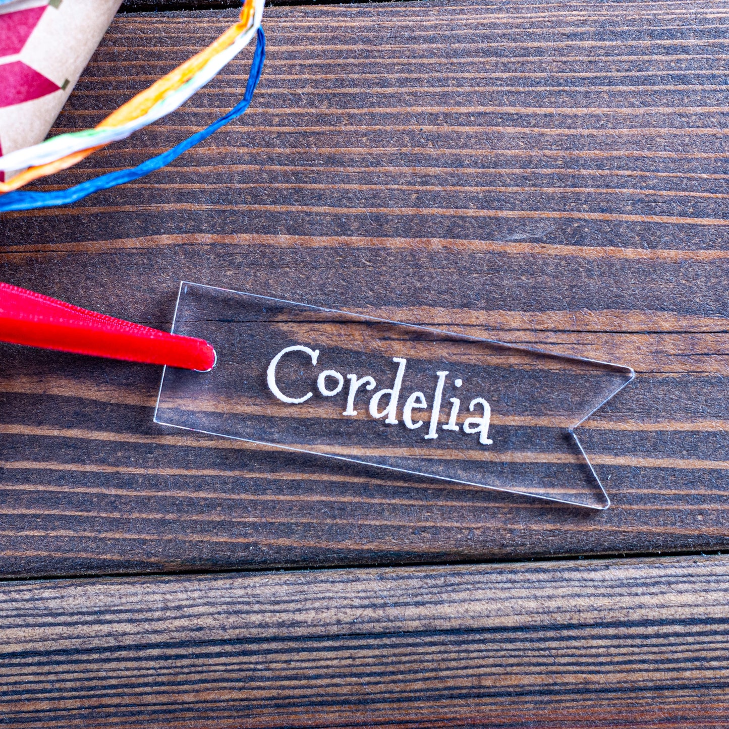 Personalised clear acrylic Christmas gift tag engraved with name