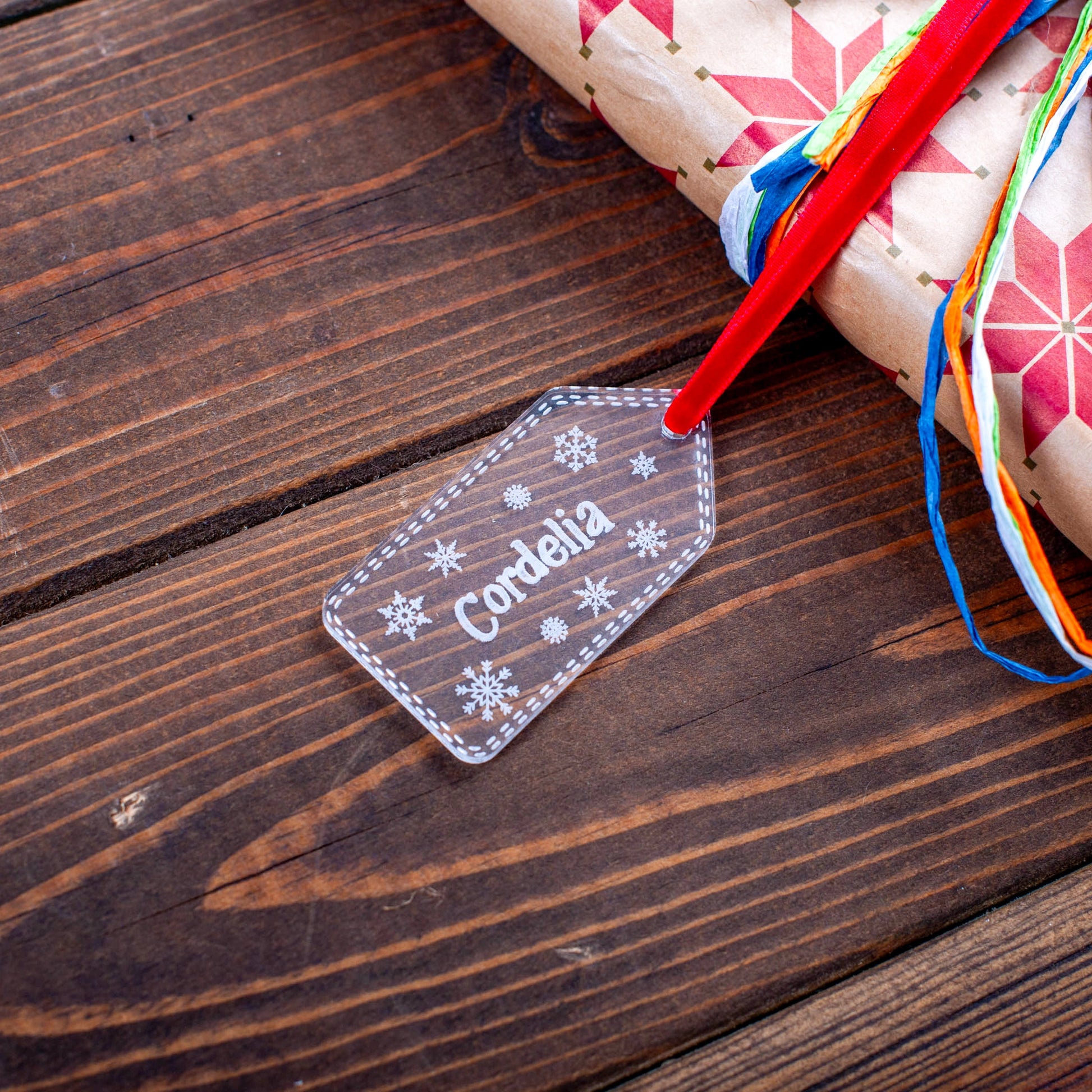 Minimalist transparent Christmas tag with engraved design