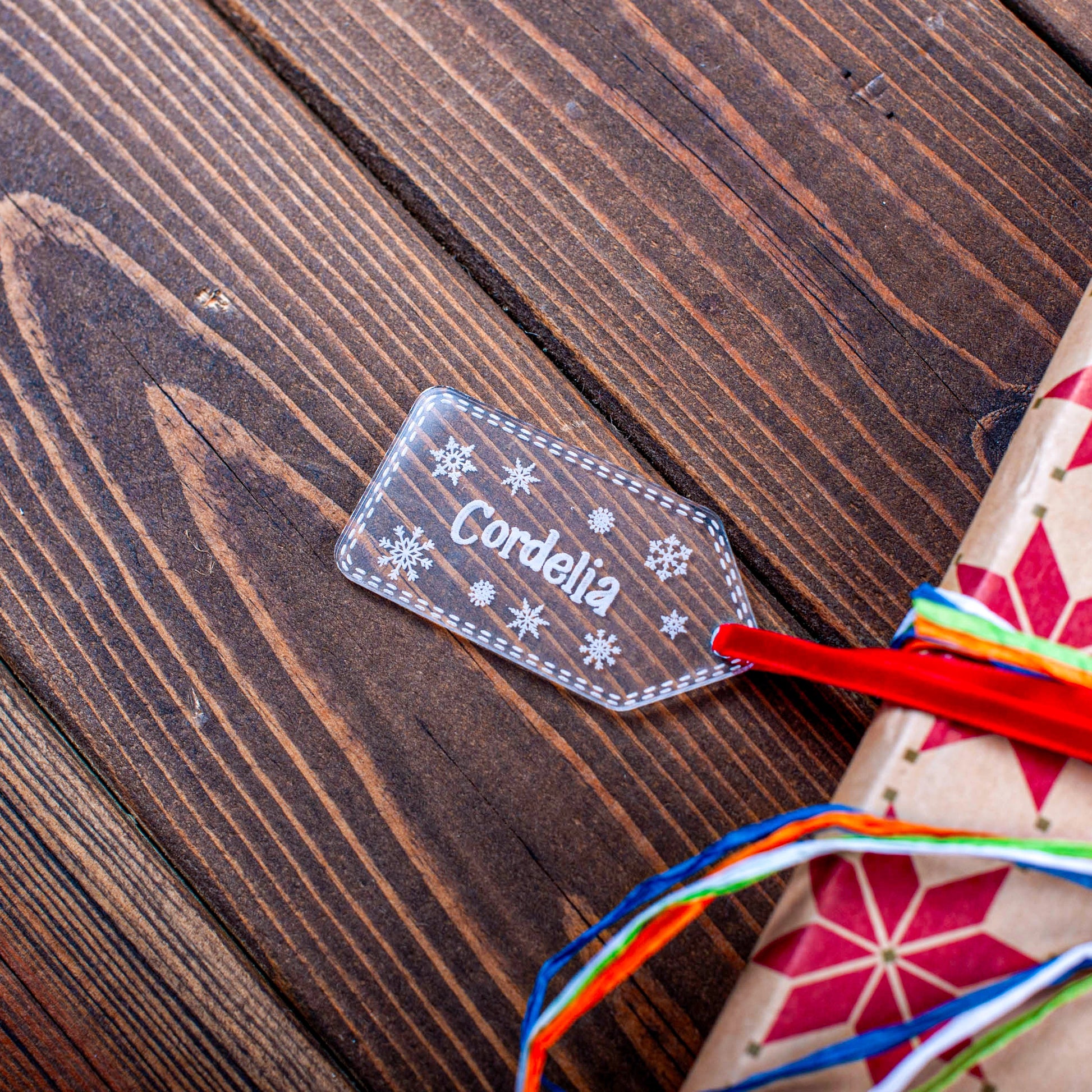Engraved clear snowflake decoration for Christmas gift wrapping