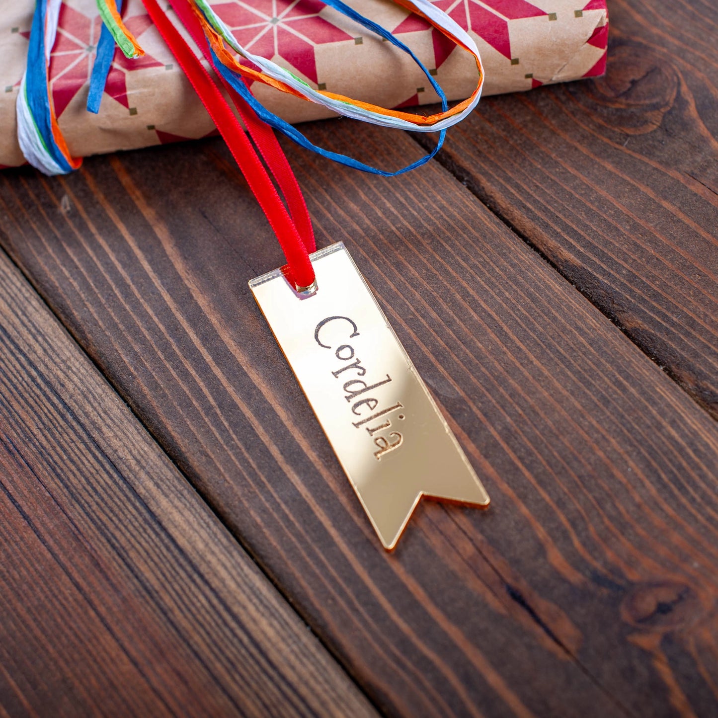 Personalised gold mirror Christmas gift tag engraved with name, luxury festive wrapping accessory