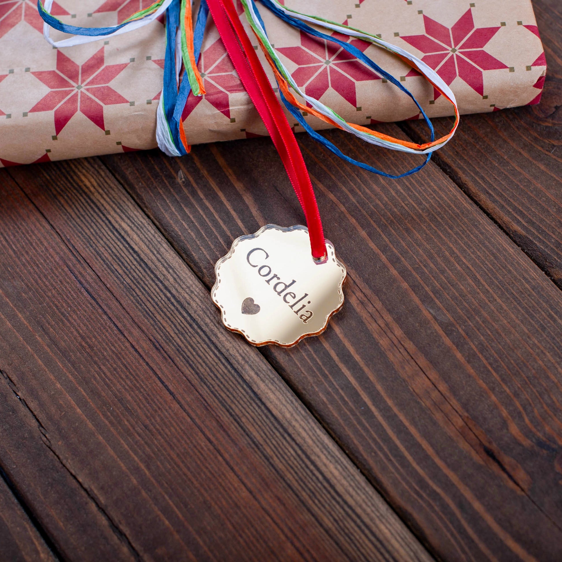 Custom gold mirror bauble tag for festive hampers and stockings