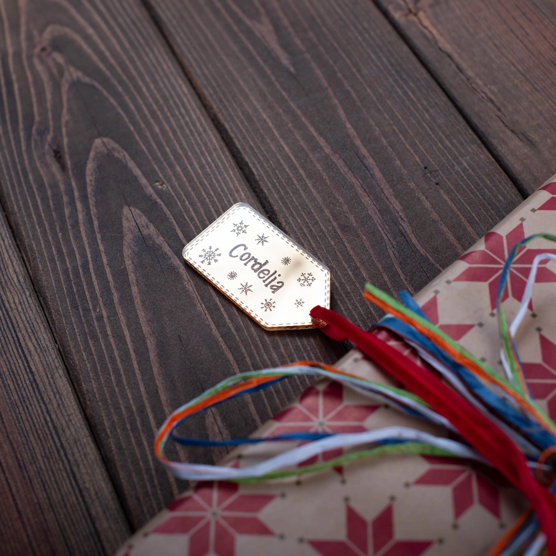 Snowflake design stocking label with engraved message